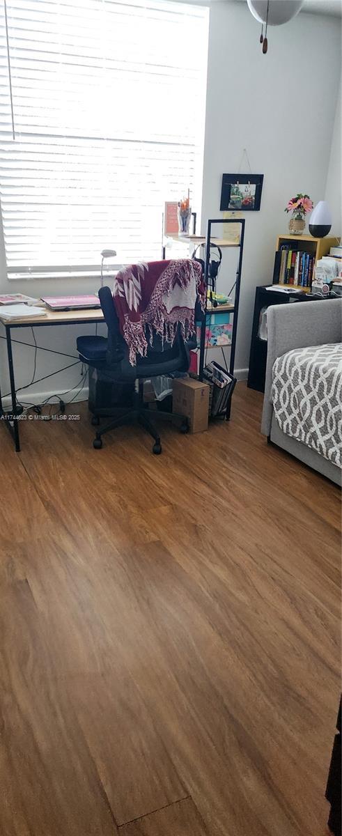 bedroom with wood finished floors