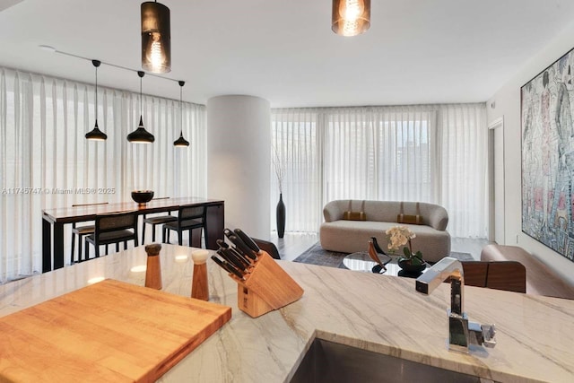 kitchen with hanging light fixtures and sink