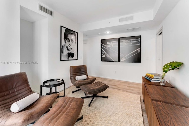 sitting room with light wood-type flooring