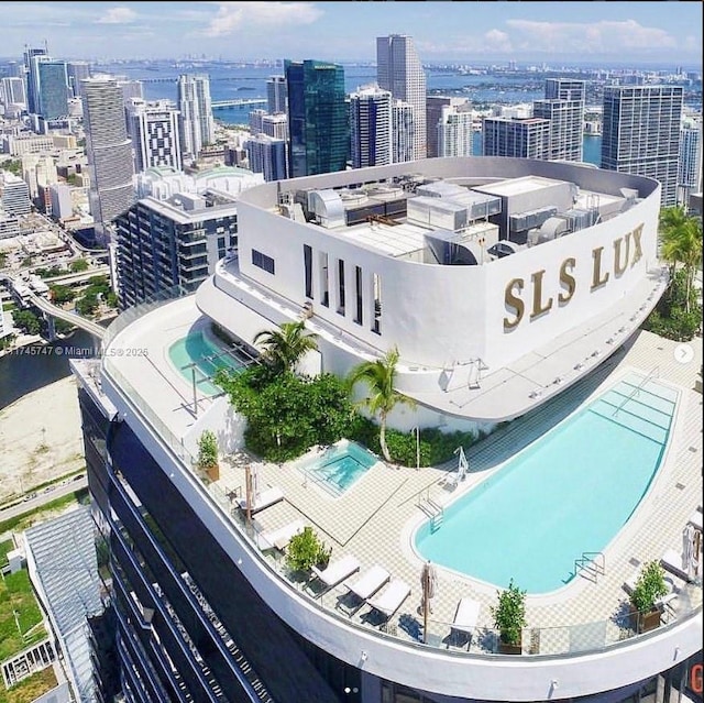 birds eye view of property featuring a water view