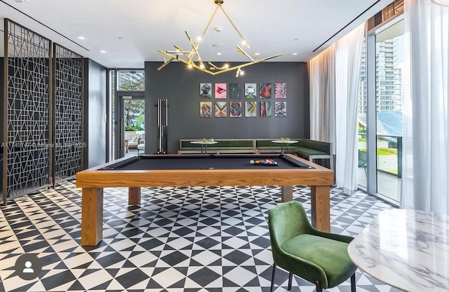 game room with a healthy amount of sunlight and billiards