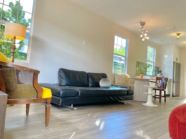 living room with light hardwood / wood-style flooring