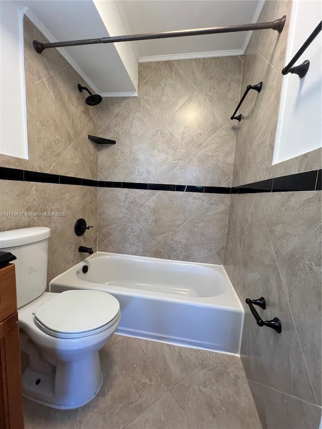 full bathroom featuring tile walls, tiled shower / bath combo, vanity, ornamental molding, and toilet