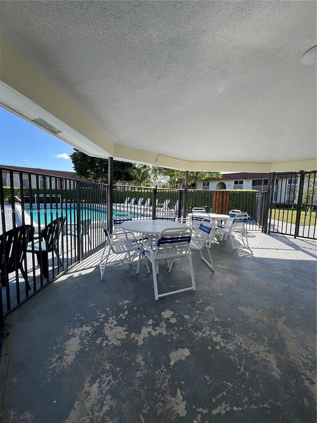 view of patio / terrace with a community pool