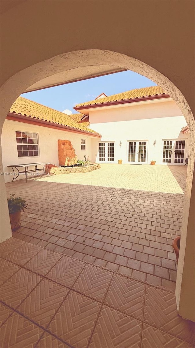 view of patio / terrace featuring french doors