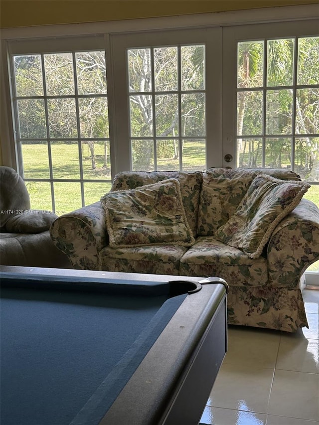 living room with tile patterned flooring