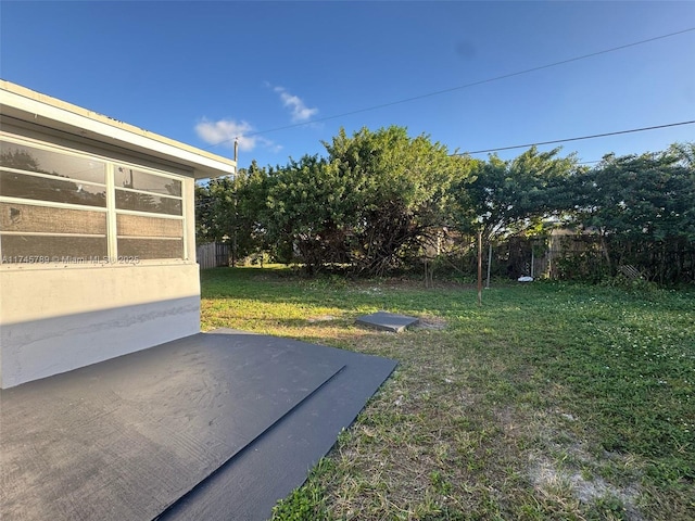 view of yard with fence