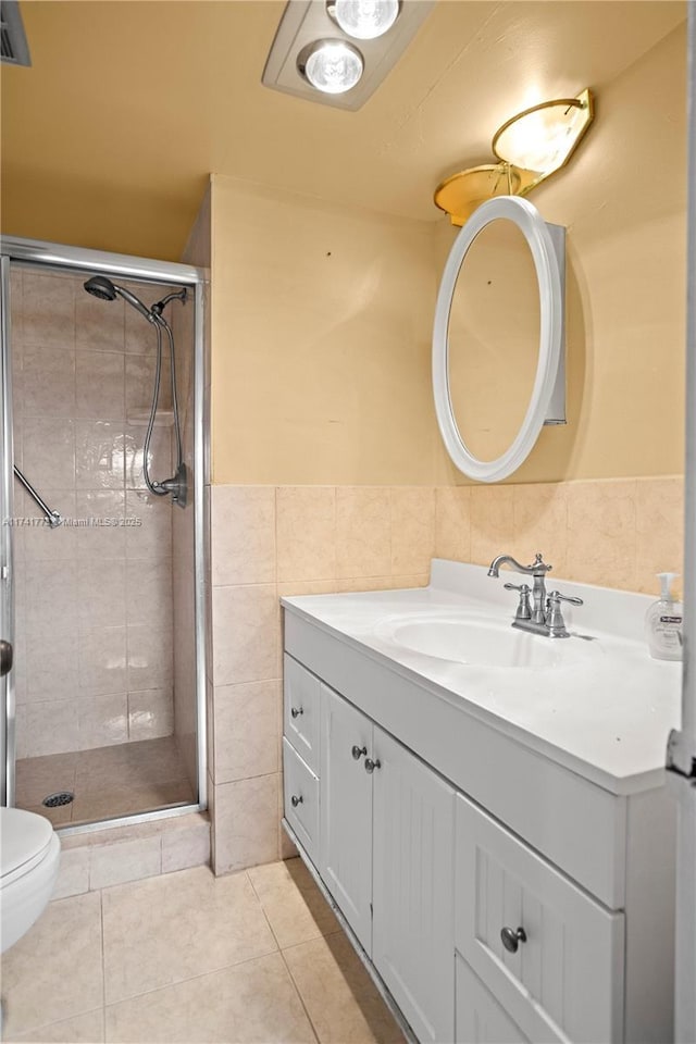 2811 N Pine Island Rd Unit 302, Sunrise, FL 33322 - bathroom featuring vanity, tile patterned flooring, toilet, tile walls, and a stall shower