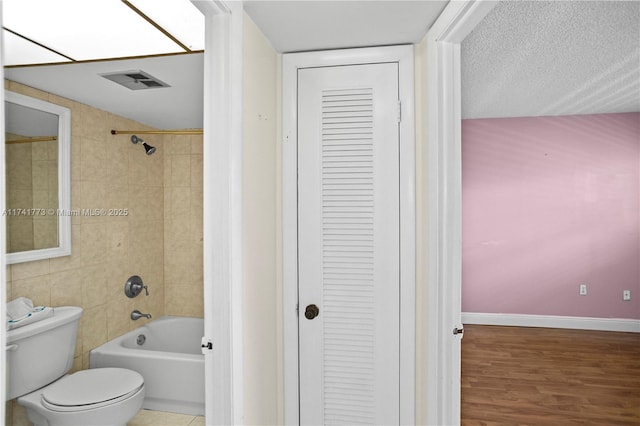 2811 N Pine Island Rd Unit 302, Sunrise, FL 33322 - bathroom with visible vents, wood finished floors, baseboards, a closet, and toilet