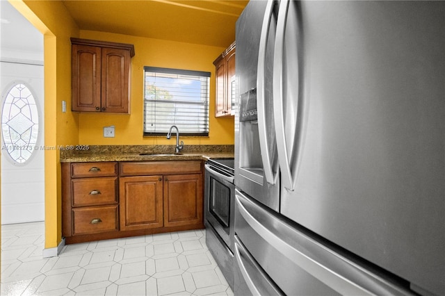 2811 N Pine Island Rd Unit 302, Sunrise, FL 33322 - kitchen featuring a sink, appliances with stainless steel finishes, and brown cabinets