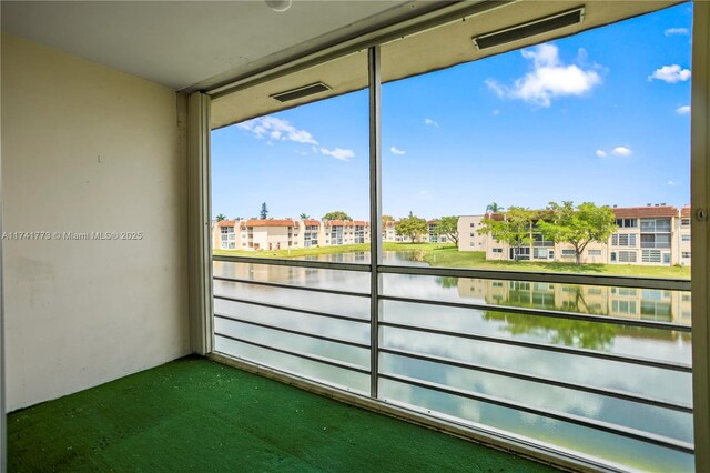 2811 N Pine Island Rd Unit 302, Sunrise, FL 33322 - balcony featuring visible vents and a water view