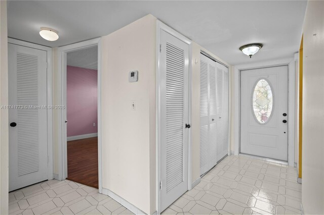 2811 N Pine Island Rd Unit 302, Sunrise, FL 33322 - entryway featuring baseboards