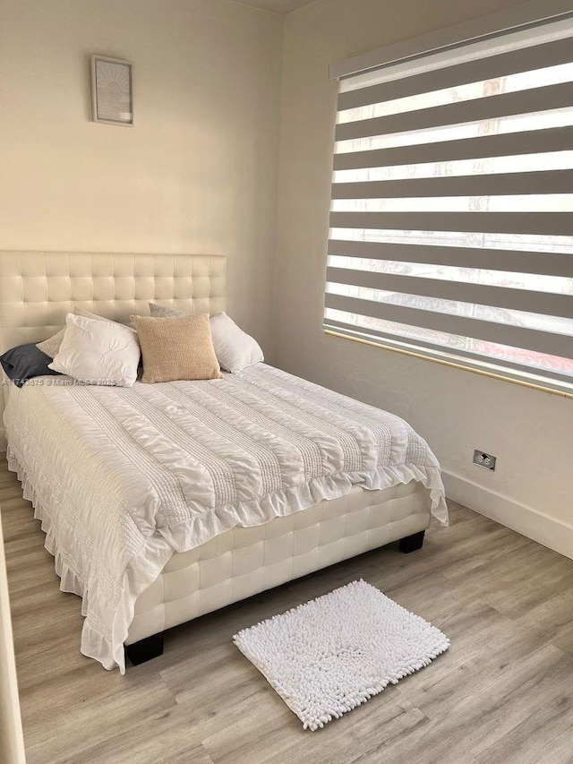 bedroom featuring light hardwood / wood-style floors