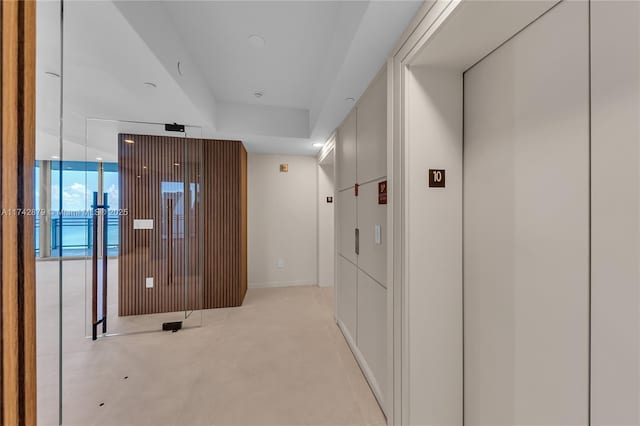 hallway featuring elevator