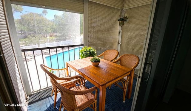 7511 S Oriole Blvd Unit 201, Delray Beach, FL 33446 - balcony with view of pool area and outdoor dining space