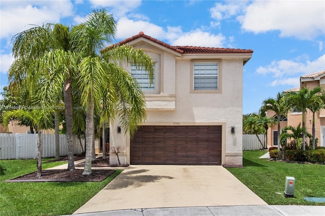 17356 SW 21st St, Miramar, FL 33029 - mediterranean / spanish house featuring an attached garage, stucco siding, driveway, and a tile roof