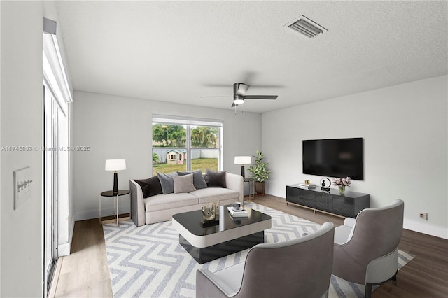 17356 SW 21st St, Miramar, FL 33029 - living area featuring wood finished floors and a ceiling fan