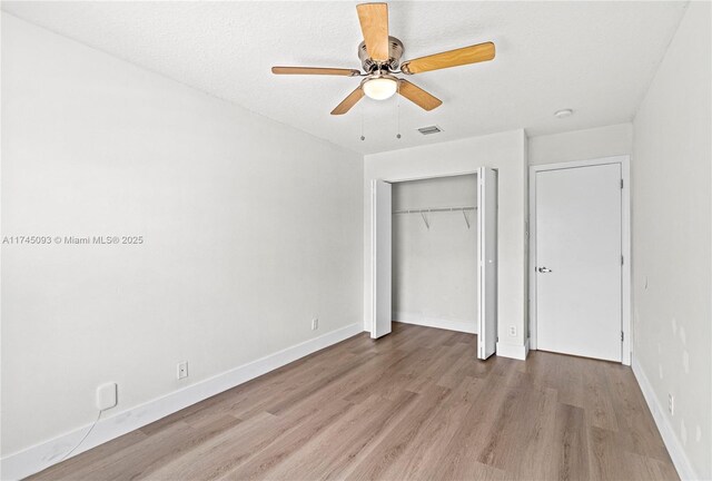 17356 SW 21st St, Miramar, FL 33029 - unfurnished bedroom featuring light wood-style flooring, a closet, baseboards, and ceiling fan
