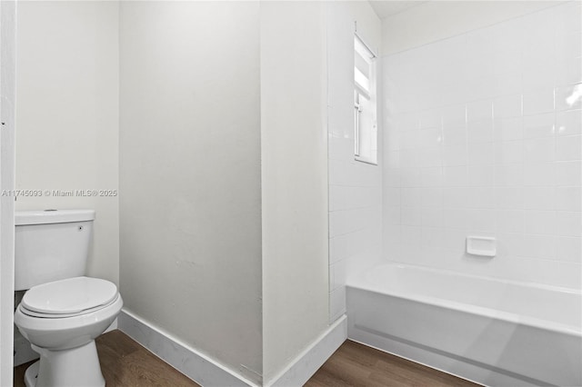 17356 SW 21st St, Miramar, FL 33029 - full bathroom with wood finished floors, toilet, and baseboards