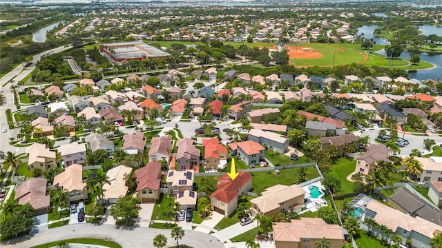 17356 SW 21st St, Miramar, FL 33029 - aerial view of property and surrounding area with a large body of water and nearby suburban area