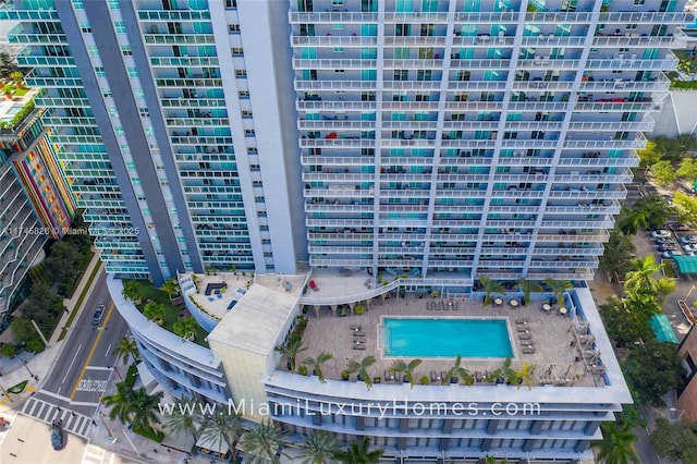 birds eye view of property with a view of city