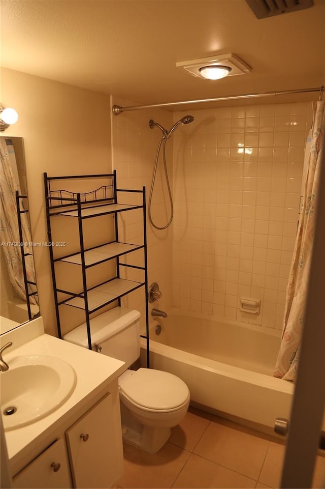 full bathroom featuring shower / tub combo with curtain, vanity, tile patterned floors, and toilet