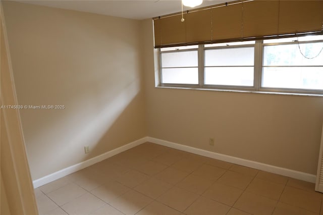 view of tiled spare room