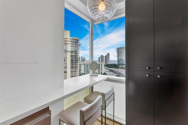 dining space featuring a view of city