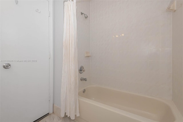 full bathroom with shower / bath combo with shower curtain