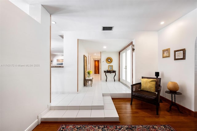 corridor featuring light hardwood / wood-style flooring