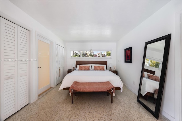 bedroom featuring multiple windows