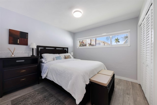 bedroom with hardwood / wood-style flooring