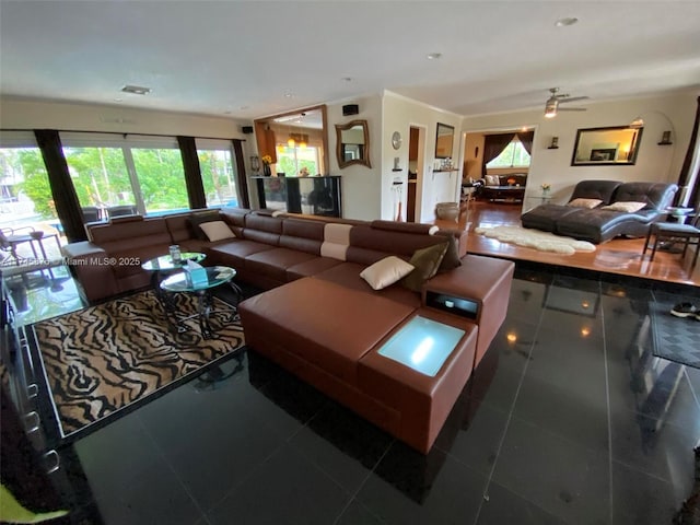 tiled living room with visible vents and recessed lighting