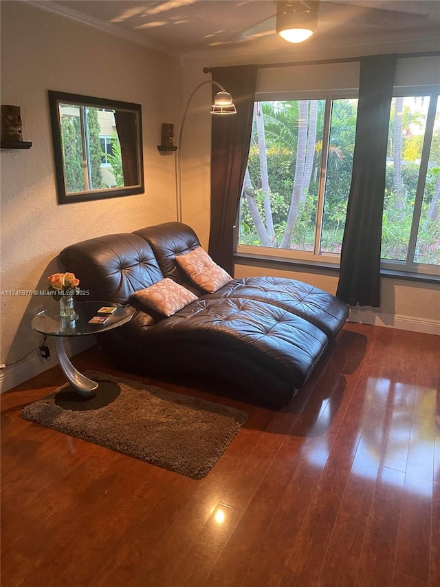 bedroom featuring wood finished floors and baseboards
