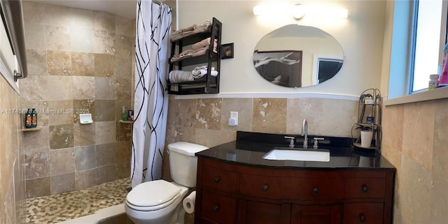 1155 S Biscayne Point Rd, Miami Beach, FL 33141 - bathroom featuring tile walls, tiled shower, and vanity