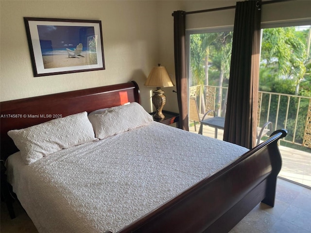 bedroom featuring access to outside and multiple windows