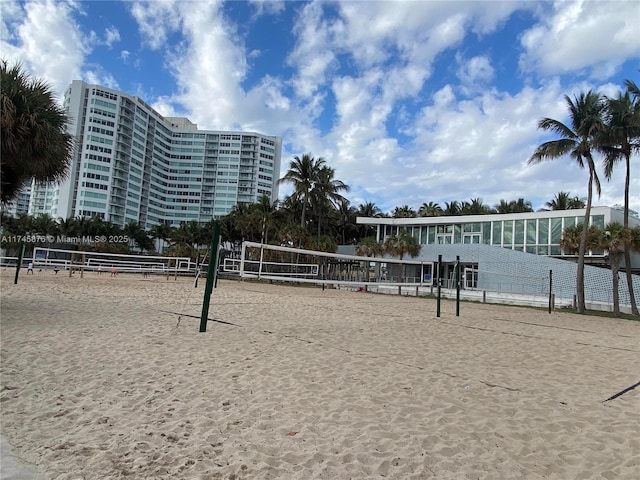 view of home's community featuring volleyball court