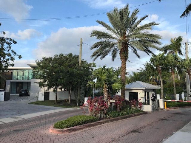 view of road featuring curbs
