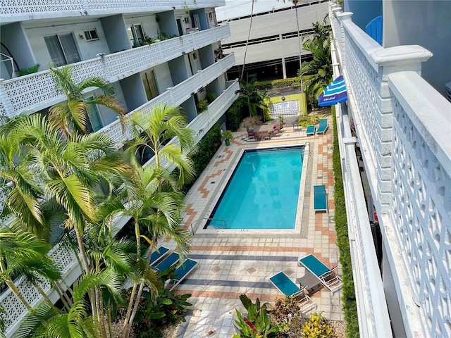 view of swimming pool featuring a patio area