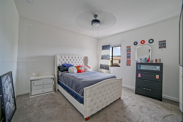 bedroom with light carpet and ceiling fan