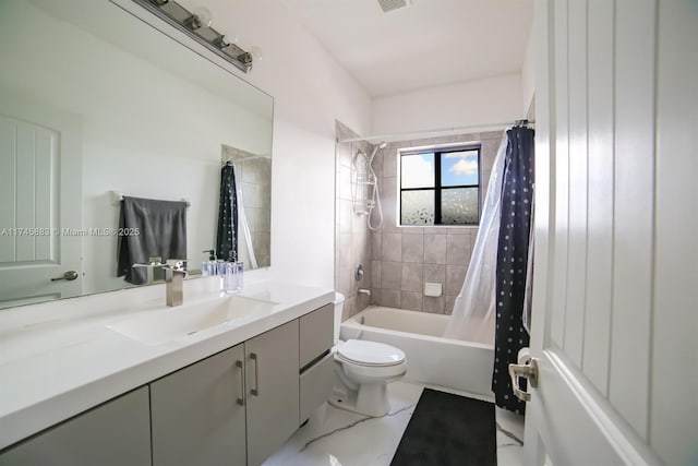 full bathroom with vanity, shower / bath combination with curtain, and toilet