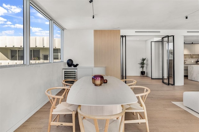 dining room featuring light hardwood / wood-style flooring