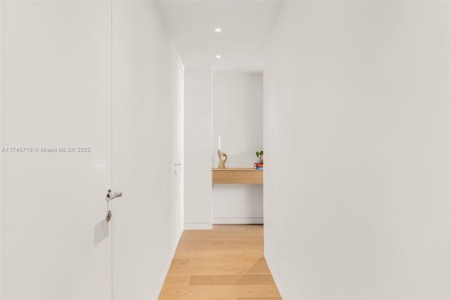 hallway featuring light hardwood / wood-style floors