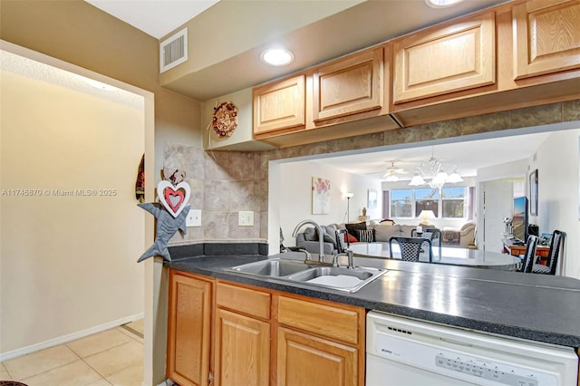 kitchen featuring dishwasher, sink, backsplash, light tile patterned floors, and ceiling fan