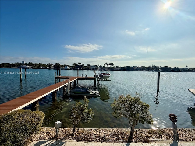 view of dock with a water view