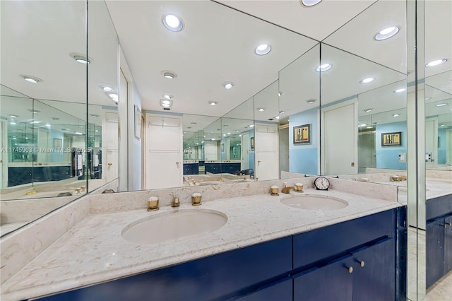 bathroom with vanity and walk in shower