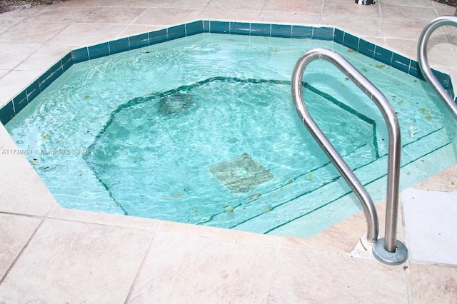 10717 Cleary Blvd Unit 203, Plantation, FL 33324 - view of pool featuring a swimming pool and an in ground hot tub