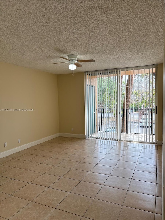 10717 Cleary Blvd Unit 203, Plantation, FL 33324 - empty room with light tile patterned flooring, a textured ceiling, ceiling fan, and baseboards