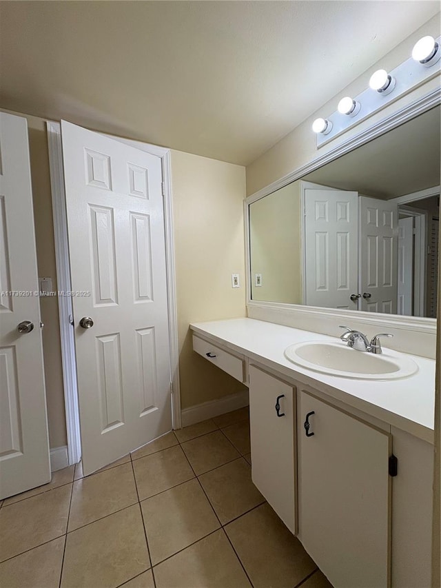 10717 Cleary Blvd Unit 203, Plantation, FL 33324 - bathroom featuring vanity, tile patterned flooring, and baseboards
