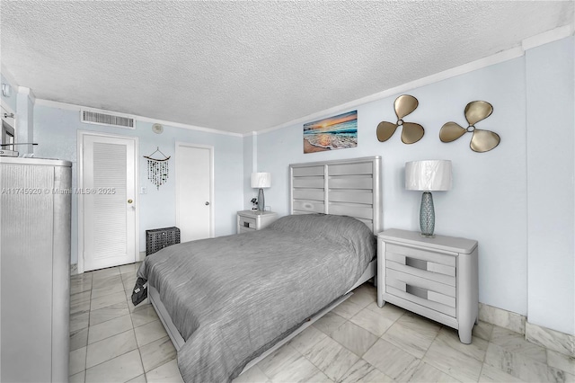 1020 Meridian Ave Unit 515, Miami Beach, FL 33139 - bedroom with a textured ceiling, visible vents, and marble finish floor